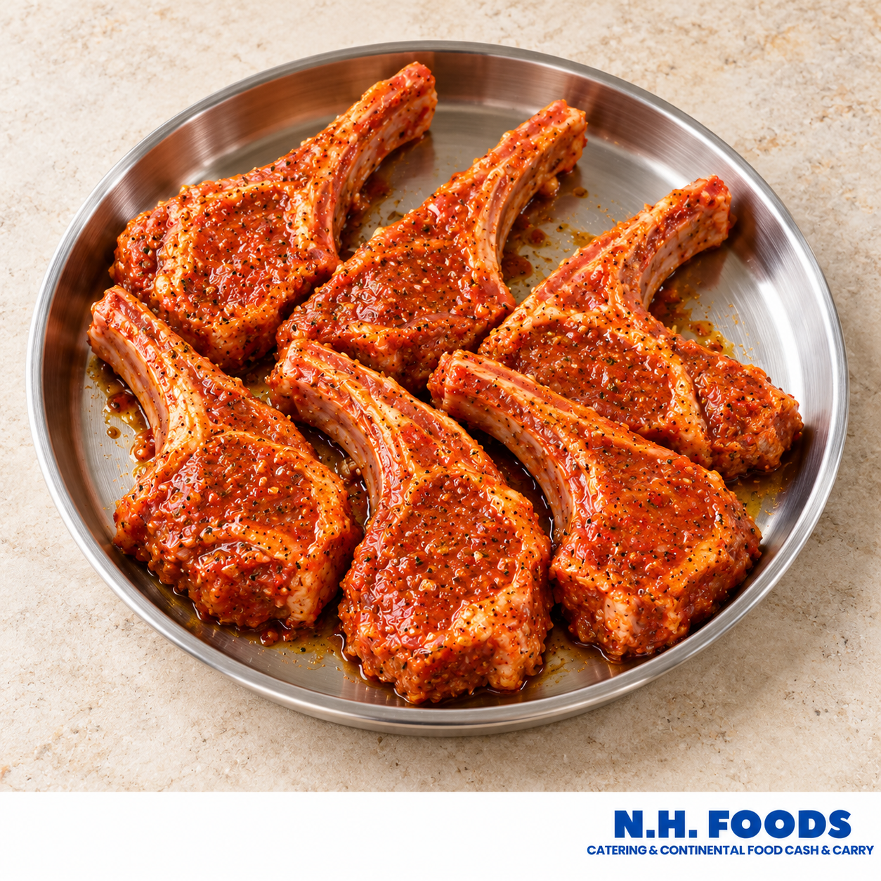Marinated lamb ribs and chops in a butcher display tray